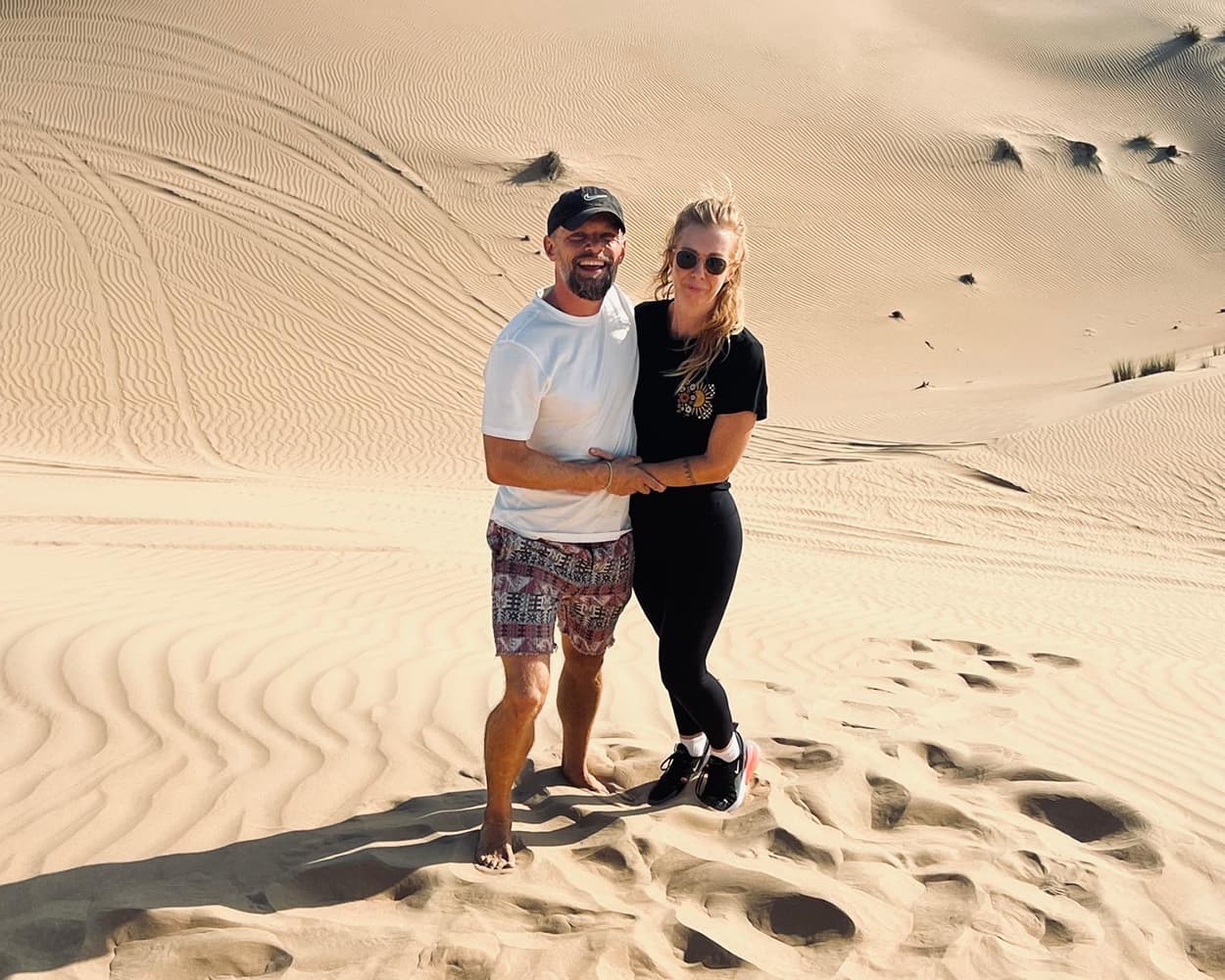 Sez with her husband in Africa